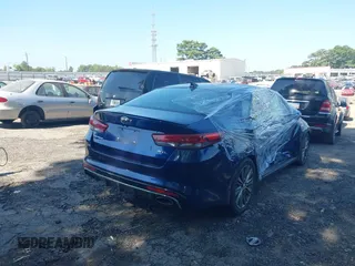 2016 Kia Optima SXL Turbo with VIN 5XXGV4L28GG087563, listed as a IAAI auction lot 39986124 with 180,160 mi miles. Bid and sale history available at carsss.com. Image 4.