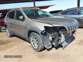 2021 Jeep Cherokee Altitude with VIN 1C4PJLLBXMD155096, listed as a IAAI auction lot 41746319 with 99,423 mi miles. Bid and sale history available at carsss.com. Image 1.