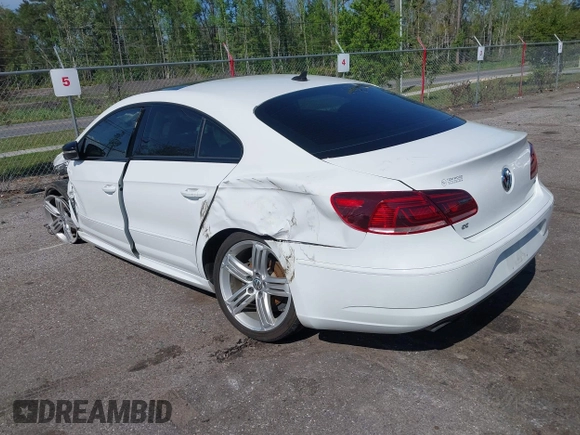 2017 Volkswagen CC R-Line Executive with VIN WVWFP7AN7HE502219, listed as a IAAI auction lot 41947387 with 96,738 mi miles and . Bid and sale history available at DreamBid. Image 3.