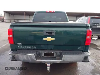 2014 Chevrolet Silverado 1500 LT with VIN 1GCVKREC7EZ312679, listed as a IAAI auction lot 40874395 with 153,234 mi miles and . Bid and sale history available at DreamBid. Image 16.