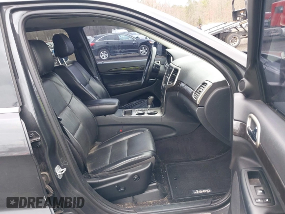 2011 Jeep Grand Cherokee Laredo with VIN 1J4RR4GGXBC597743, listed as a IAAI auction lot 41897286 with 253,111 mi miles and . Bid and sale history available at DreamBid. Image 5.
