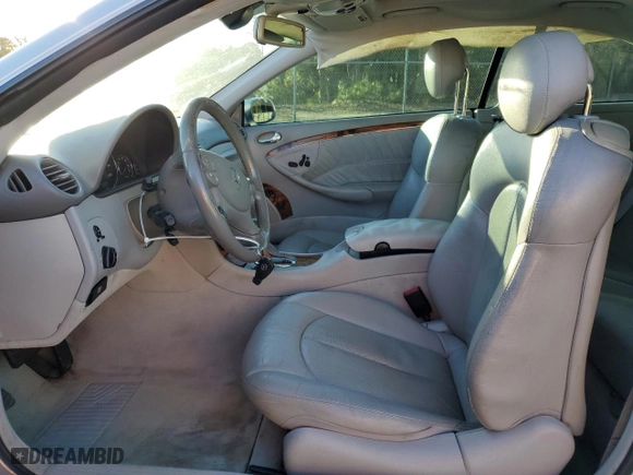 2003 Mercedes-Benz CLK-Class 5.0L with VIN WDBTJ75JX3F052823, listed as a Copart auction lot 87321334 with 132,774 mi miles and Salvage Title. Bid and sale history available at carsss.com. Image 7.