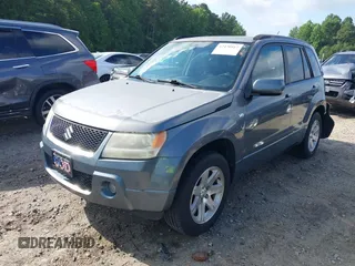 2006 Suzuki Grand Vitara Luxury z VIN JS3TE947864103082, wystawiony jako IAAI lot #42470917 z przebiegiem 155 702 mil mil oraz . Historia ofert i sprzedaży dostępna na DreamBid. Obrazek 18.