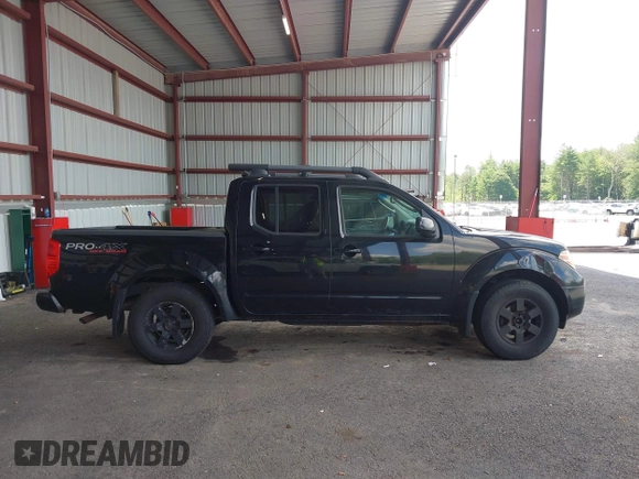 2011 Nissan Frontier Pro-4X with VIN 1N6AD0EV6BC437545, listed as a IAAI auction lot 42633761 with 181,753 mi miles and . Bid and sale history available at DreamBid. Image 13.