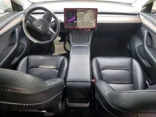 2021 Tesla Model 3 Standard Range Plus z VIN 5YJ3E1EA8MF098935, wystawiony jako Copart lot #53267905 z przebiegiem 116 673 mil mil oraz Szkody całkowita. Historia ofert i sprzedaży dostępna na DreamBid. Obrazek 8.