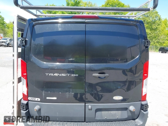 2015 Ford Transit Cargo z VIN 1FTBW2YG7FKA20201, wystawiony jako IAAI lot #42253463 z przebiegiem 83 235 mil mil oraz . Historia ofert i sprzedaży dostępna na DreamBid. Obrazek 6.