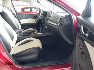 2014 Mazda 3 S Grand Touring with VIN JM1BM1M38E1200696, listed as a IAAI auction lot 41906426 with 50,048 mi miles and . Bid and sale history available at DreamBid. Image 5.