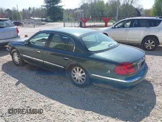 2000 Lincoln Continental with VIN 1LNHM97VXYY759969, listed as a IAAI auction lot 41892082 with 114,389 mi miles and . Bid and sale history available at DreamBid. Image 3.