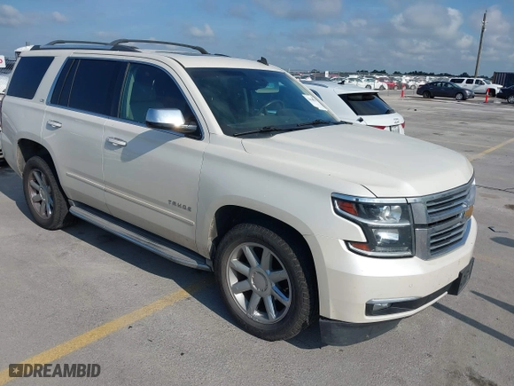 2015 Chevrolet Tahoe LTZ with VIN 1GNSCCKC4FR142856, listed as a IAAI auction lot 39886899 with 134,301 mi miles. Bid and sale history available at carsss.com. Image 1.