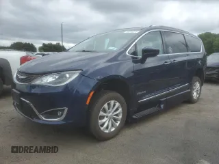 2019 Chrysler Pacifica Touring L with VIN 2C4RC1BG8KR708584, listed as a Copart auction lot 58310275 with 57,747 mi miles and Salvage title. Bid and sale history available at DreamBid. Image 1.