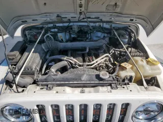 2004 Jeep Wrangler Rubicon z VIN 1J4FA69S34P757352, wystawiony jako Copart lot #52971745 z przebiegiem 139 855 mil mil oraz Szkoda całkowita • Salvage title. Historia ofert i sprzedaży dostępna na DreamBid. Obrazek 12.