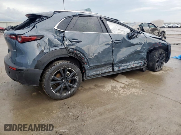 2023 Mazda CX-30 S Carbon Edition with VIN 3MVDMBCM7PM534442, listed as a Copart auction lot 60341565 with 15,068 mi miles and Salvage title. Bid and sale history available at DreamBid. Image 3.