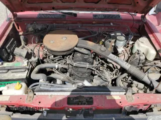 1986 Nissan Hardbody E z VIN JN6ND11SXGW022401, wystawiony jako Copart lot #51545335 z przebiegiem 187 680 mil mil oraz Czysty tytuł • Clean title. Historia ofert i sprzedaży dostępna na DreamBid. Obrazek 11.