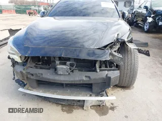 2019 Infiniti Q60 Luxe with VIN JN1EV7EL0KM291021, listed as a IAAI auction lot 41589716 with 59,235 mi miles and . Bid and sale history available at DreamBid. Image 6.