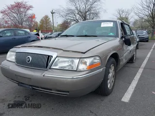 2003 Mercury Grand Marquis LS Premium z VIN 2MEFM75W73X653224, wystawiony jako IAAI lot #42038256 z przebiegiem 145 374 mil mil oraz . Historia ofert i sprzedaży dostępna na DreamBid. Obrazek 2.