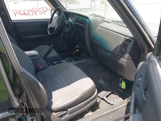 1999 Jeep Cherokee Sport with VIN 1J4FF68S0XL509171, listed as a IAAI auction lot 42402214 with Not provided miles and . Bid and sale history available at DreamBid. Image 5.