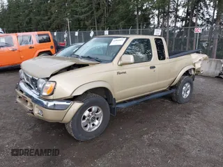 1999 Nissan Frontier XE z VIN 1N6ED26Y6XC307228, wystawiony jako IAAI lot #41804816 z przebiegiem 62 863 mil mil oraz . Historia ofert i sprzedaży dostępna na DreamBid. Obrazek 2.