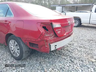 2014 Toyota Camry L with VIN 4T1BF1FK4EU862137, listed as a IAAI auction lot 41800089 with 171,716 mi miles and . Bid and sale history available at DreamBid. Image 6.