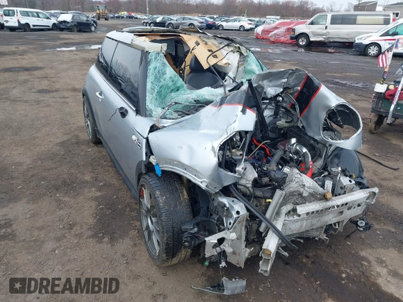 2006 MINI Hardtop S with VIN WMWRE33546TL23876, listed as a IAAI auction lot 41858060 with 146,359 mi miles and . Bid and sale history available at DreamBid. Image 17.