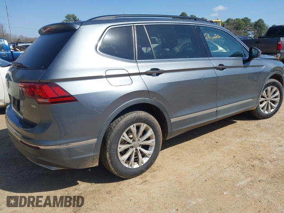 2018 Volkswagen Tiguan SEL with VIN 3VV3B7AX6JM001231, listed as a IAAI auction lot 41781659 with 137,930 mi miles and . Bid and sale history available at DreamBid. Image 4.