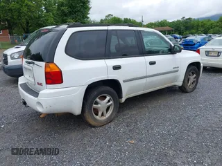 2006 GMC Envoy SLE z VIN 1GKDT13S562116159, wystawiony jako IAAI lot #42361666 z przebiegiem 243 466 mil mil oraz . Historia ofert i sprzedaży dostępna na DreamBid. Obrazek 4.