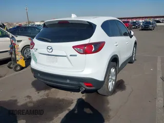 2014 Mazda CX-5 Grand Touring with VIN JM3KE4DY4E0375809, listed as a IAAI auction lot 41468078 with 151,226 mi miles. Bid and sale history available at carsss.com. Image 4.