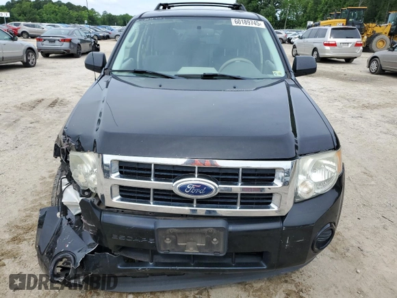 2012 Ford Escape XLS with VIN 1FMCU9C71CKA30319, listed as a Copart auction lot 60189745 with 214,736 mi miles and Salvage title. Bid and sale history available at DreamBid. Image 5.