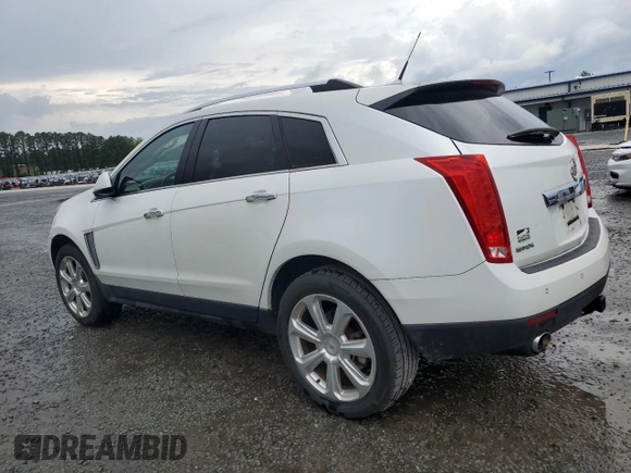2013 Cadillac SRX Premium Collection with VIN 3GYFNEE32DS644426, listed as a Copart auction lot 59775625 with 106,240 mi miles and Salvage title. Bid and sale history available at DreamBid. Image 2.