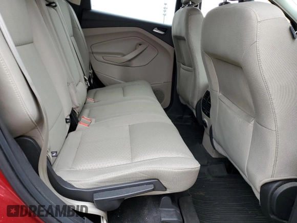 2018 Ford Escape SE z VIN 1FMCU9GD7JUB01668, wystawiony jako Copart lot #57038675 z przebiegiem 70 780 mil mil oraz Szkoda całkowita • Salvage title. Historia ofert i sprzedaży dostępna na DreamBid. Obrazek 11.