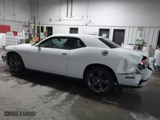 2013 Dodge Challenger SXT with VIN 2C3CDYAG8DH554016, listed as a IAAI auction lot 41275678 with 55,826 mi miles. Bid and sale history available at carsss.com. Image 14.