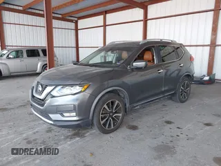2018 Nissan Rogue SV with VIN JN8AT2MT9JW485804, listed as a IAAI auction lot 41711723 with 74,860 mi miles and . Bid and sale history available at carsss.com. Image 2.