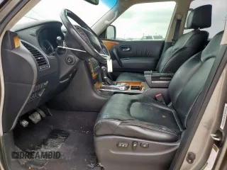 2011 Infiniti QX56 7-passenger with VIN JN8AZ2NF8B9504124, listed as a Copart auction lot 54612735 with 220,399 mi miles and Clean Title. Bid and sale history available at DreamBid. Image 7.