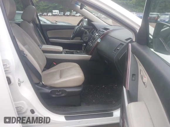 2013 Mazda CX-9 Grand Touring z VIN JM3TB2DA6D0414080, wystawiony jako IAAI lot #42310153 z przebiegiem 190 991 mil mil oraz . Historia ofert i sprzedaży dostępna na DreamBid. Obrazek 5.