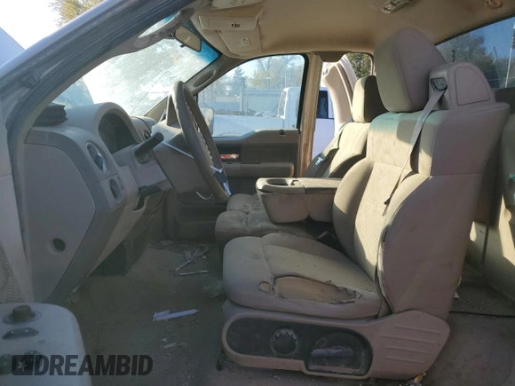 2007 Ford F-150 XL with VIN 1FTRF14V47KC19429, listed as a Copart auction lot 80147594 with 101,749 mi miles and Salvage title. Bid and sale history available at DreamBid. Image 7.