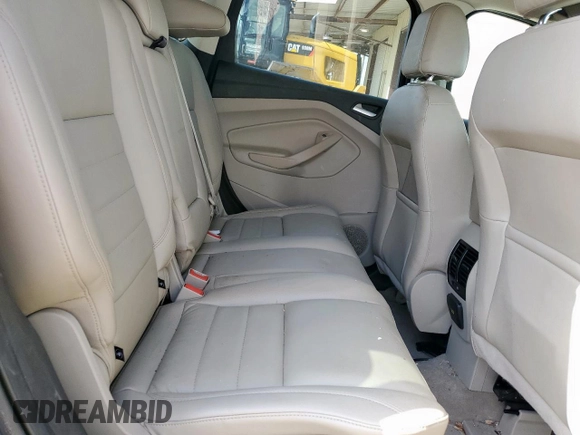 2016 Ford Escape Titanium с VIN 1FMCU9J97GUB28172, выставлен на аукционе Copart как лот 59658095 с пробегом Не указан миль и Списание • Salvage title. История ставок и продаж доступна на DreamBid. Изображение 11.