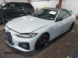 2024 BMW 4 Series 430i xDrive with VIN WBA43AT00RCN83317, listed as a IAAI auction lot 41211849 with 12,000 mi miles and . Bid and sale history available at DreamBid. Image 18.