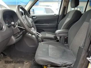 2011 Jeep Patriot Sport with VIN 1J4NF1GB4BD140947, listed as a Copart auction lot 52035655 with 183,024 mi miles and Salvage Title. Bid and sale history available at DreamBid. Image 7.