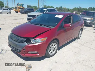 2010 Honda Insight EX with VIN JHMZE2H71AS021062, listed as a IAAI auction lot 41857350 with 45,558 mi miles and . Bid and sale history available at carsss.com. Image 18.
