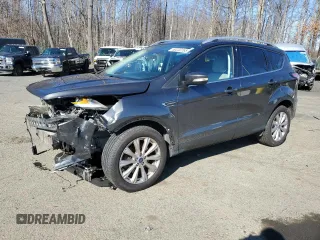 2018 Ford Escape Titanium with VIN 1FMCU9J92JUB61376, listed as a Copart auction lot 50232265 with 87,038 mi miles and Salvage title. Bid and sale history available at DreamBid. Image 1.