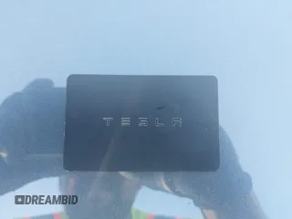 2020 Tesla Model 3 Long Range with VIN 5YJ3E1EB6LF647510, listed as a IAAI auction lot 41692902 with 69,736 mi miles. Bid and sale history available at carsss.com. Image 11.