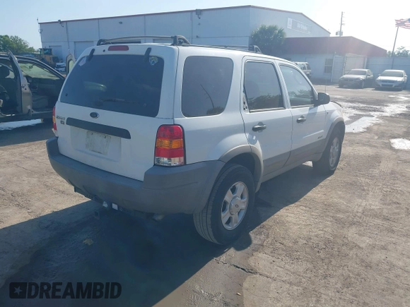 2002 Ford Escape XLT Choice with VIN 1FMYU03132KD02414, listed as a IAAI auction lot 42121509 with 218,148 mi miles and . Bid and sale history available at DreamBid. Image 4.