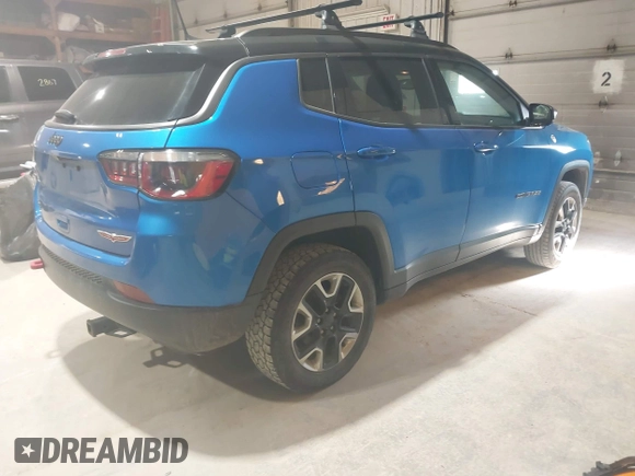 2018 Jeep Compass Trailhawk with VIN 3C4NJDDB3JT234529, listed as a IAAI auction lot 41973123 with 173,559 mi miles and . Bid and sale history available at DreamBid. Image 4.