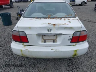 1996 Honda Accord LX with VIN 1HGCD5635TA031485, listed as a IAAI auction lot 42132216 with 158,686 mi miles and . Bid and sale history available at carsss.com. Image 6.