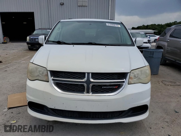 2014 Dodge Grand Caravan SXT z VIN 2C4RDGCG7ER214087, wystawiony jako Copart lot #61096815 z przebiegiem 131 241 mil mil oraz Czysty tytuł • Clean title. Historia ofert i sprzedaży dostępna na DreamBid. Obrazek 5.