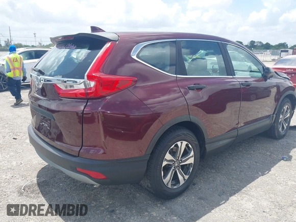 2019 Honda CR-V LX with VIN 2HKRW5H33KH402697, listed as a IAAI auction lot 41942219 with 80,826 mi miles. Bid and sale history available at carsss.com. Image 4.