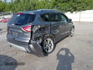 2013 Ford Escape Titanium with VIN 1FMCU0J96DUC31879, listed as a IAAI auction lot 42637019 with 66,096 mi miles and . Bid and sale history available at DreamBid. Image 4.