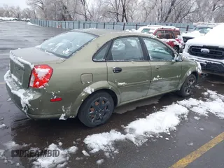 2004 Suzuki Forenza S z VIN KL5JD52Z64K027219, wystawiony jako IAAI lot #41799510 z przebiegiem Nie podano mil oraz . Historia ofert i sprzedaży dostępna na DreamBid. Obrazek 4.