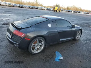 2010 Audi R8 z VIN WUAAUAFG0AN000963, wystawiony jako Copart lot #84955394 z przebiegiem 96 738 mil mil oraz Szkody całkowita. Historia ofert i sprzedaży dostępna na DreamBid. Obrazek 3.
