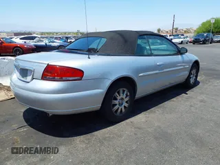 2004 Chrysler Sebring Limited z VIN 1C3EL65R94N150421, wystawiony jako IAAI lot #42614705 z przebiegiem 75 610 mil mil oraz . Historia ofert i sprzedaży dostępna na DreamBid. Obrazek 4.