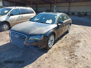 2011 Audi A8 with VIN WAURVAFDXBN014290, listed as a IAAI auction lot 40860777 with 152,584 mi miles and . Bid and sale history available at DreamBid. Image 17.